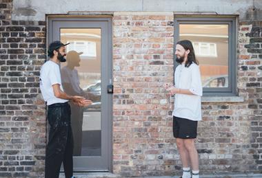 Two colleagues having a chat on their break