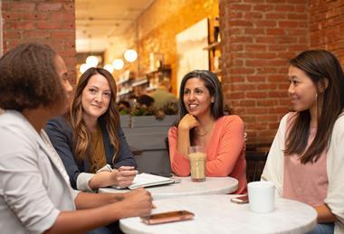 Women talking over lunch