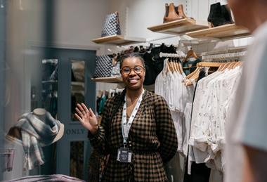 Smiling shop worker