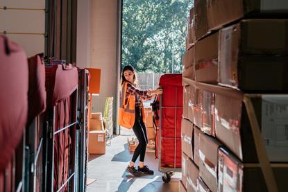 Young woman working in a warehouse