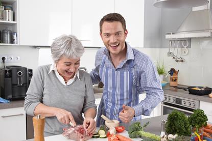 Man and woman having fun cooking together