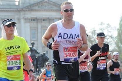 Adam running the marathon