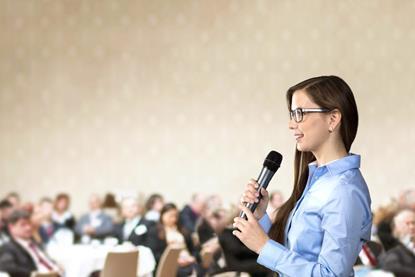 woman talking at an event